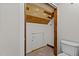 Cozy bathroom includes updated toilet and shelving within a small space at 5900 Ebenezer Church Rd, Raleigh, NC 27612