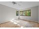 Bedroom with multiple windows letting in an abundance of natural light at 5900 Ebenezer Church Rd, Raleigh, NC 27612