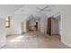 A large bedroom with exposed subfloor and natural light coming from the window at 5900 Ebenezer Church Rd, Raleigh, NC 27612