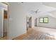 A partially finished bedroom includes natural light, closet space and an overhead ceiling fan at 5900 Ebenezer Church Rd, Raleigh, NC 27612