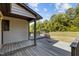 The home has a deck extending down the side of the home at 5900 Ebenezer Church Rd, Raleigh, NC 27612