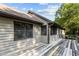 The home features an extensive deck that wraps around the side of the property at 5900 Ebenezer Church Rd, Raleigh, NC 27612