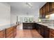 Well-lit kitchen with granite countertops and stainless steel appliances at 5900 Ebenezer Church Rd, Raleigh, NC 27612