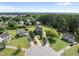 Panoramic aerial perspective of a neighborhood with lush greenery, mature trees, and various home styles at 6 W Canterbury Ct, Wendell, NC 27591