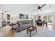 Bright living room with hardwood floors, stylish decor, and comfortable seating furniture at 6 W Canterbury Ct, Wendell, NC 27591