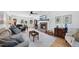 Bright living room with hardwood floors, a fireplace, and comfortable seating furniture at 6 W Canterbury Ct, Wendell, NC 27591