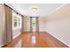 Bedroom featuring hardwood floors and large windows providing natural light at 6080 Us 421 N, Lillington, NC 27546