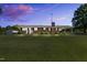Charming single-story brick home featuring a spacious front lawn and a covered carport at 6080 Us 421 N, Lillington, NC 27546