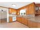 Spacious kitchen offering wood cabinets and granite countertops at 6080 Us 421 N, Lillington, NC 27546