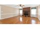 Spacious living room featuring a brick fireplace and hardwood flooring at 6080 Us 421 N, Lillington, NC 27546