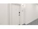 Apartment hallway with unit number 215 and a modern, clean aesthetic at 615 Daniels St # 215, Raleigh, NC 27605
