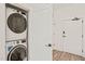 Convenient laundry area features stackable washer and dryer at 615 Daniels St # 215, Raleigh, NC 27605