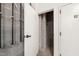 Basement storage unit with secure door at 615 Daniels St # 215, Raleigh, NC 27605