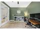 Spacious office featuring French doors, ample storage space, and natural light at 619 E Hatterleigh Ave, Hillsborough, NC 27278