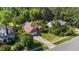 Charming brick home features a lush lawn and inviting curb appeal in a serene setting at 624 Powhatan Dr, Fuquay Varina, NC 27526