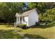 Exterior angle of home with stone walkway and well maintained lawn at 624 Powhatan Dr, Fuquay Varina, NC 27526
