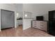 Open-concept kitchenette with appliances and tile flooring at 624 Powhatan Dr, Fuquay Varina, NC 27526