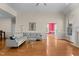 Spacious living room featuring hardwood floors, neutral walls, and ample natural light at 624 Powhatan Dr, Fuquay Varina, NC 27526