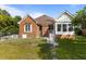 Rear exterior view with brick facade and fenced in yard at 624 Powhatan Dr, Fuquay Varina, NC 27526