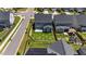Aerial view of a gray two-story house with a fenced backyard at 6624 Vestal St, Wake Forest, NC 27587