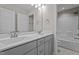 Bathroom featuring double vanity, tile floors, and access to the shower and toilet at 6624 Vestal St, Wake Forest, NC 27587