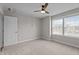 Bedroom with neutral walls, carpet, window with blinds, and ceiling fan at 6624 Vestal St, Wake Forest, NC 27587