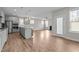 Open concept kitchen featuring stainless steel appliances and a center island at 6624 Vestal St, Wake Forest, NC 27587