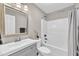 Bathroom features a vanity, framed mirror, shower/tub combination, and recessed lighting at 8140 Consella Way, Willow Springs, NC 27592