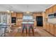 Beautiful kitchen with a central island, hardwood floors, and abundant cabinet space at 85 Clubhouse Dr, Youngsville, NC 27596