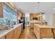 Bright kitchen with a long countertop and hardwood floors at 85 Clubhouse Dr, Youngsville, NC 27596