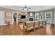 Bright living room with hardwood floors, comfortable seating, and a cozy fireplace perfect for relaxation at 85 Clubhouse Dr, Youngsville, NC 27596