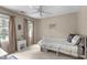 Bedroom features a ceiling fan, curtains, and a single bed at 8536 Wolverton Fields Dr, Wake Forest, NC 27587