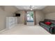 Bonus room with media area, lots of light and comfortable seating at 8536 Wolverton Fields Dr, Wake Forest, NC 27587