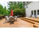 Spacious wooden deck features outdoor seating, grill, and lounging area at 8536 Wolverton Fields Dr, Wake Forest, NC 27587