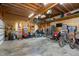Large garage interior with ample storage and organization options, including shelving and overhead storage at 8536 Wolverton Fields Dr, Wake Forest, NC 27587