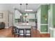 Well-equipped kitchen with granite countertops, a kitchen island with seating, and an open layout at 8536 Wolverton Fields Dr, Wake Forest, NC 27587