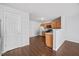 Well-equipped kitchen with wood cabinets, essential appliances, and ample countertop space for cooking at 8630 Neuse Landing # 105, Raleigh, NC 27616