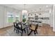 Dining area next to the kitchen features large windows, and a view into the living room at 88 Mable Court # 17, Lillington, NC 27546
