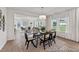 Dining room featuring a table set for six, open to living room at 88 Mable Court # 17, Lillington, NC 27546