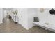 An entryway featuring hardwood floors, a bench and a decorative console table at 88 Mable Court # 17, Lillington, NC 27546