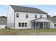 Exterior view of a new construction featuring a screened-in porch and lawn at 88 Mable Court # 17, Lillington, NC 27546