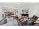 Comfortable living room with stylish furniture and an open layout to dining and kitchen at 88 Mable Court # 17, Lillington, NC 27546
