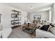 Inviting living area featuring plush seating, a stylish coffee table, and contemporary decor at 88 Mable Court # 17, Lillington, NC 27546