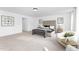Open main bedroom with a large bed, sitting area, and plenty of space for relaxation and personalization at 88 Mable Court # 17, Lillington, NC 27546