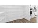 A large walk-in pantry has abundant shelving for organized storage and easy access to kitchen necessities at 88 Mable Court # 17, Lillington, NC 27546