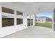 A screened-in porch offering seamless transition to the backyard and natural light at 88 Mable Court # 17, Lillington, NC 27546