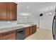 The kitchen provides open views of the adjoined dining room and living spaces at 9211 Calabria Dr # 104, Raleigh, NC 27617