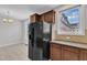 Additional cabinets and countertop area near the refrigerator at 9211 Calabria Dr # 104, Raleigh, NC 27617