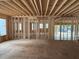 Spacious interior framing showcases potential living spaces with natural light at 93 Bur Oak Ct, Pittsboro, NC 27312
