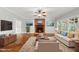 Cozy living room featuring a fireplace, modern decor, and an open floor plan at 1007 Surry Dale Ct, Apex, NC 27502